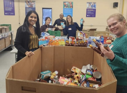 OpenText employees volunteering at the food bank