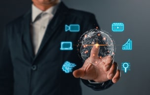 person pressing a globe on screen