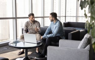 2 co-workers meeting