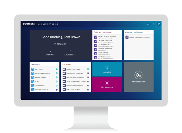 A desktop computer showing the OpenText Core Journey platform