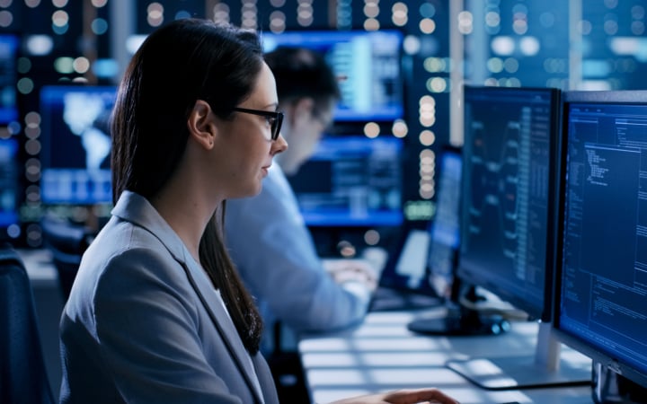 Technician working in a command center