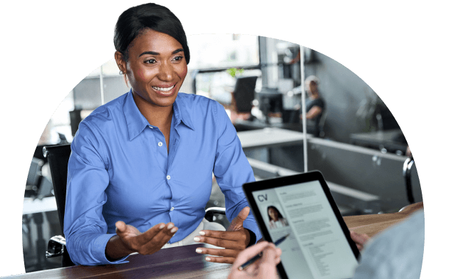 Job applicant discussing their resume with HR professional