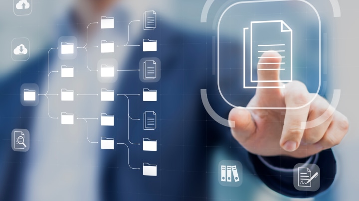 Person touching a virtual document and folder interface