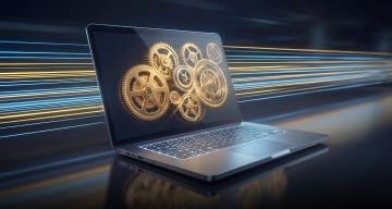 A laptop with golden gears on its screen