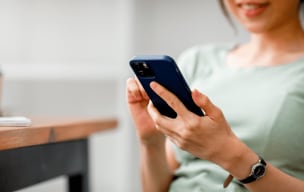 Person looking at smart phone