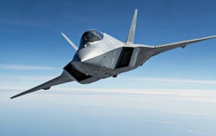 A fighter jet in the air from front angle