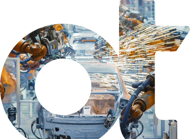 Image of OpenText ‘ot’ watermark with automobile production and manufacturing background