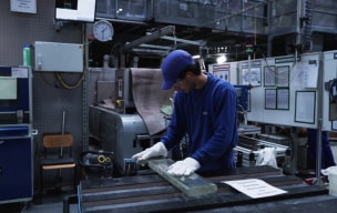 A person working on a machinery