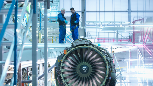 Two persons talking on a plane stock