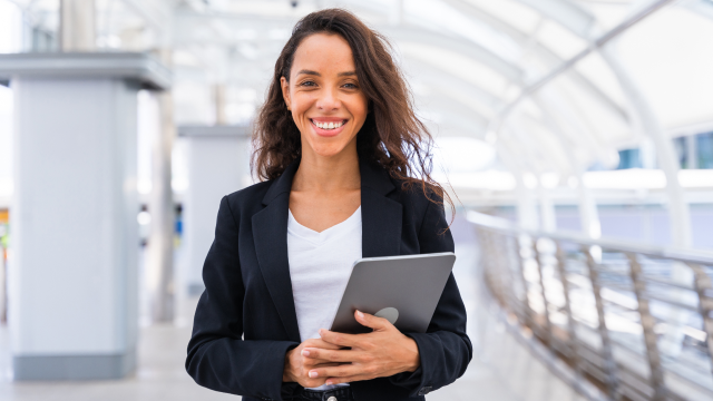 businessperson holding a tablet