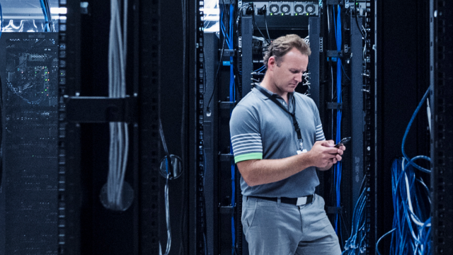 a person viewing a phone with data storage 