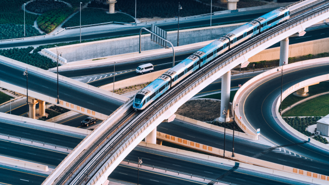 The bullet train speeds along the railway track