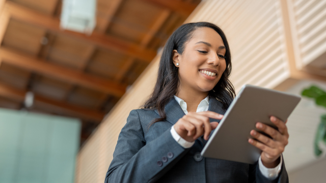 A person looking at a tablet