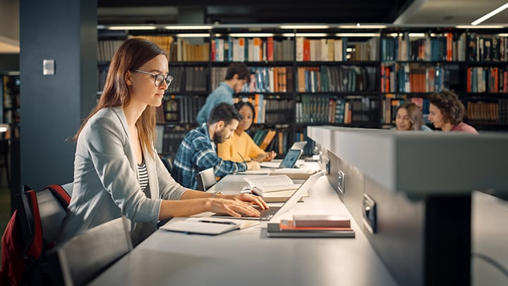 Students studying in library