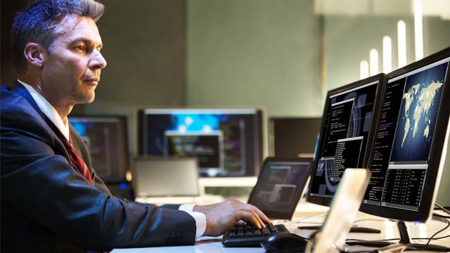 person typing on computer