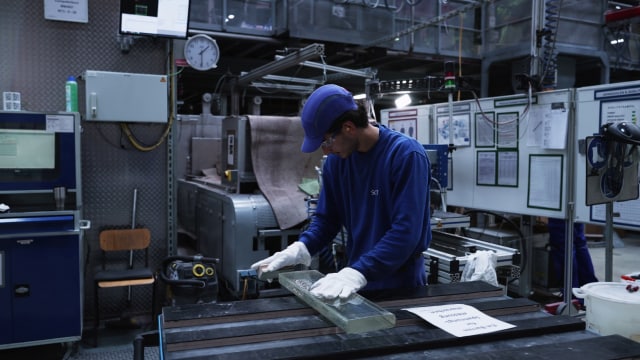 A Glass manufacturing worker